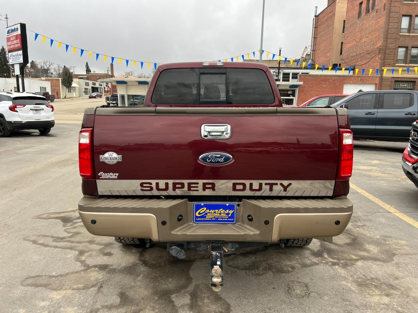 2012 Maroon /Brown Ford F-350 SD King Ranch (1FT8W3BT7CE) with an 6.7L V8 F OHV 32V DIESEL engine, Automatic transmission, located at 116 5th Avenue South, Lewistown, MT, 59457, 47.063877, -109.427879 - Introducing the ultimate combination of power and luxury – the 2012 Ford F350 Crew Cab King Ranch 4x4. With its robust Powerstroke diesel engine, this truck is built to handle anything you throw at it. Whether you're towing a trailer or cruising around town, the F350 delivers top-notch performance - Photo #3
